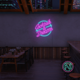 LED-neonskilt «Cocktails & Dreams» i rosa og turkis lys