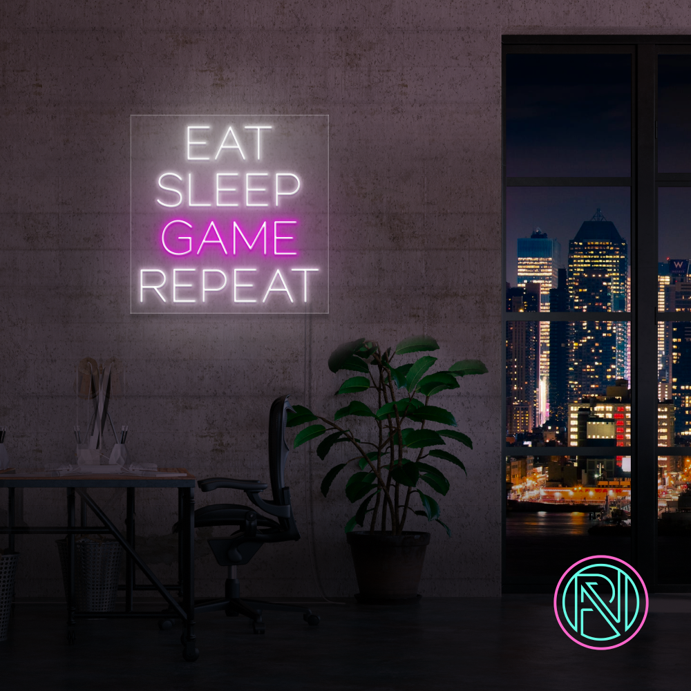 LED neonskilt i rosa med teksten «EAT SLEEP GAME REPEAT»