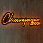 LED-neonskilt «ChampagneROOM» oransje lysstriper i sort kant.
